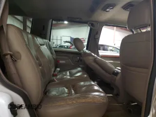 2000 Cadillac Escalade z VIN 1GYEK63R0YR185780, wystawiony jako Copart lot #80620994 z przebiegiem 16 717 mil mil oraz Szkody całkowita. Historia ofert i sprzedaży dostępna na DreamBid. Obrazek 11.