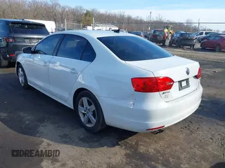 2014 Volkswagen Jetta TDI w/Premium/Nav with VIN 3VWLL7AJ0EM281741, listed as a IAAI auction lot 41508560 with 148,000 mi miles and . Bid and sale history available at DreamBid. Image 3.