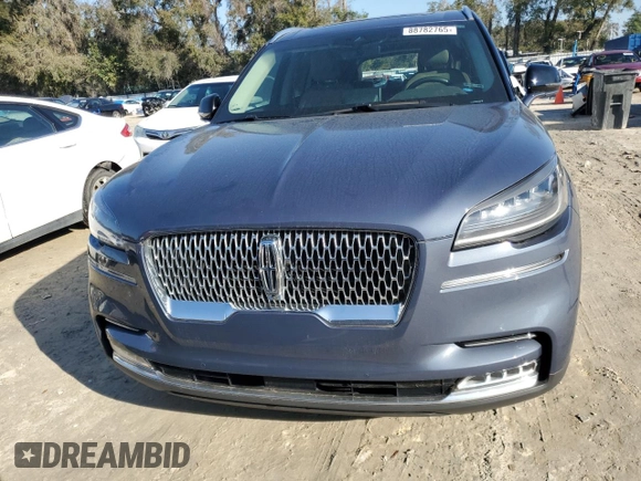 2021 Lincoln Aviator Reserve z VIN 5LM5J7WC9MGL01854, wystawiony jako Copart lot #88782765 z przebiegiem 87 789 mil mil oraz Nie do naprawy • Non repairable. Historia ofert i sprzedaży dostępna na DreamBid. Obrazek 5.