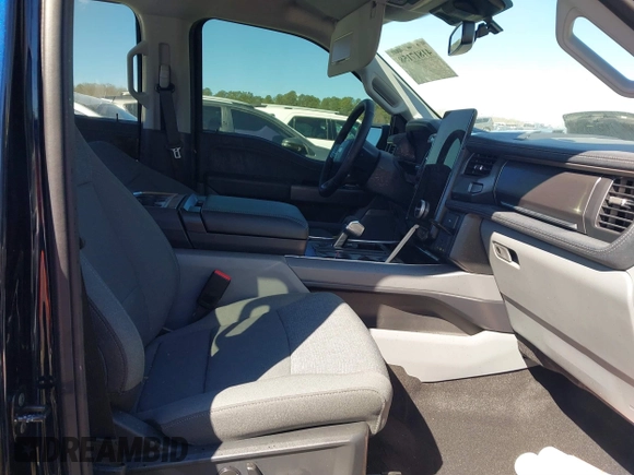 2024 Ford F-150 Lightning Flash with VIN 1FT6W3L75RWG30755, listed as a IAAI auction lot 41817158 with 1,932 mi miles and . Bid and sale history available at DreamBid. Image 5.