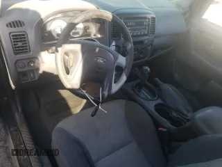 2005 Ford Escape XLS Value with VIN 1FMYU02Z35KB13600, listed as a Copart auction lot 71581184 with 187,747 mi miles and Salvage Title. Bid and sale history available at carsss.com. Image 8.