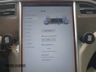 2013 Tesla Model S with VIN 5YJSA1AC3DFP10537, listed as a IAAI auction lot 40707549 with 103,111 mi miles and . Bid and sale history available at DreamBid. Image 18.