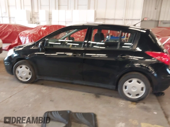 2009 Nissan Versa 1.8 S with VIN 3N1BC13E39L415491, listed as a IAAI auction lot 41614914 with 104,795 mi miles. Bid and sale history available at carsss.com. Image 14.