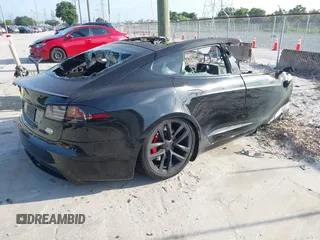 2022 Tesla Model S Plaid z VIN 5YJSA1E64NF477659, wystawiony jako IAAI lot #42358072 z przebiegiem Nie podano mil oraz . Historia ofert i sprzedaży dostępna na DreamBid. Obrazek 4.