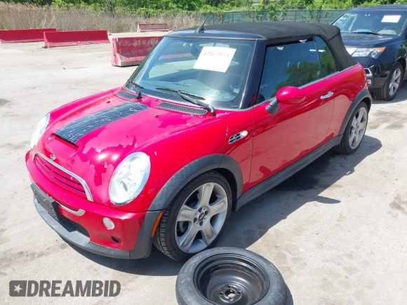2006 MINI Convertible S with VIN WMWRH33586TK59381, listed as a IAAI auction lot 42165953 with 94,109 mi miles and . Bid and sale history available at DreamBid. Image 2.