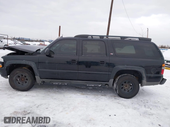 2005 Chevrolet Suburban Z71 with VIN 3GNFK16ZX5G284585, listed as a IAAI auction lot 41588062 with 212,848 mi miles. Bid and sale history available at carsss.com. Image 14.