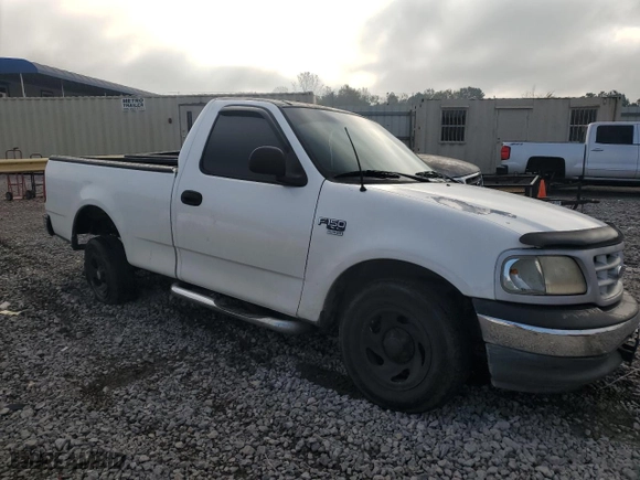 1999 Ford F-150 Work Series with VIN 1FTRF17W3XKA08534, listed as a Copart auction lot 79764674 with 0 mi miles and Salvage Title. Bid and sale history available at carsss.com. Image 4.