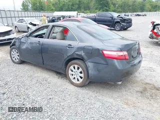 2009 Toyota Camry LE z VIN 4T1BK46KX9U594987, wystawiony jako IAAI lot #42039029 z przebiegiem 156 812 mil mil oraz . Historia ofert i sprzedaży dostępna na DreamBid. Obrazek 3.