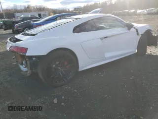 2018 Audi R8 V10 z VIN WUABAAFX5J7902445, wystawiony jako Copart lot #80124934 z przebiegiem Nie podano mil oraz Szkody całkowita. Historia ofert i sprzedaży dostępna na DreamBid. Obrazek 3.