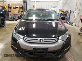 2010 Honda Insight EX z VIN JHMZE2H72AS009647, wystawiony jako Copart lot #60079205 z przebiegiem 157 844 mil mil oraz Czysty tytuł • Clean title. Historia ofert i sprzedaży dostępna na DreamBid. Obrazek 5.