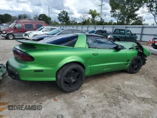 2001 Pontiac Firebird Formula z VIN 2G2FV22G412115819, wystawiony jako Copart lot #70310714 z przebiegiem 203 067 mil mil oraz Szkody całkowita. Historia ofert i sprzedaży dostępna na DreamBid. Obrazek 3.