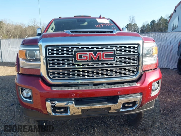 2018 GMC Sierra 2500HD Denali z VIN 1GT12UEY6JF272619, wystawiony jako IAAI lot #41743216 z przebiegiem 165 231 mil mil oraz . Historia ofert i sprzedaży dostępna na DreamBid. Obrazek 12.