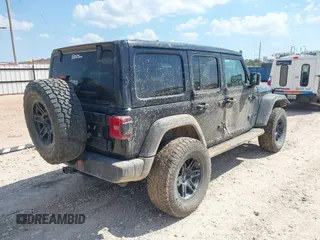 2022 Jeep Wrangler Unlimited Sport with VIN 1C4HJXDG7NW120432, listed as a IAAI auction lot 40498948 with 11,235 mi miles and . Bid and sale history available at DreamBid. Image 4.