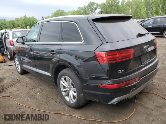 2018 Audi Q7 Premium with VIN WA1AAAF72JD000694, listed as a Copart auction lot 55625414 with 55,602 mi miles and Salvage title. Bid and sale history available at DreamBid. Image 2.