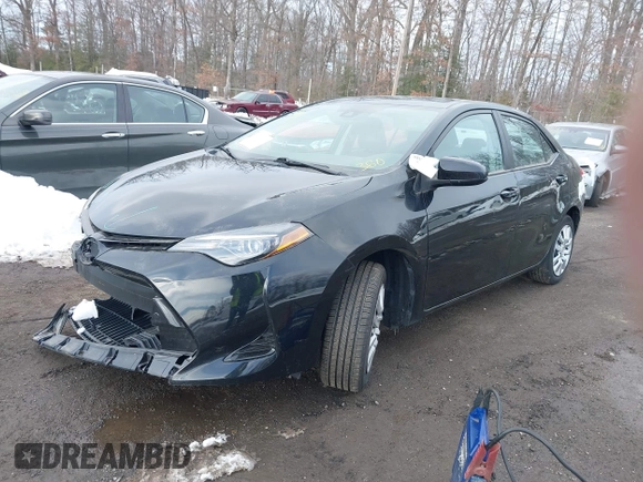 2018 Toyota Corolla L z VIN 5YFBURHE0JP801312, wystawiony jako IAAI lot #41235233 z przebiegiem 92 340 mil mil oraz . Historia ofert i sprzedaży dostępna na DreamBid. Obrazek 17.