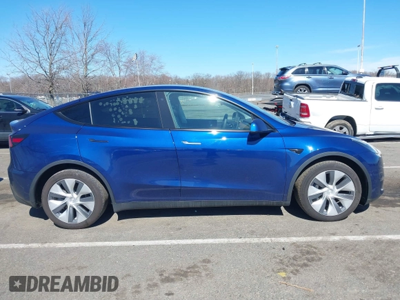 2020 Tesla Model Y Long Range with VIN 5YJYGDEF4LF005534, listed as a IAAI auction lot 41830910 with 32,438 mi miles and . Bid and sale history available at DreamBid. Image 12.