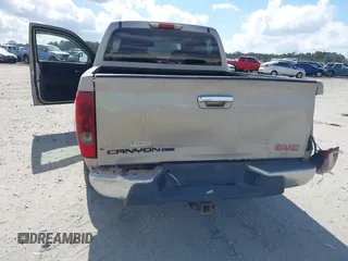2009 GMC Canyon SLE1 with VIN 1GTCS139998131563, listed as a IAAI auction lot 41561682 with 211,603 mi miles. Bid and sale history available at carsss.com. Image 6.