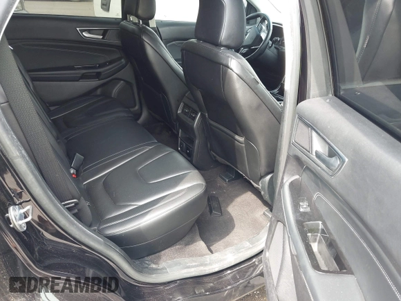 2020 Ford Edge Titanium z VIN 2FMPK3K92LBB24713, wystawiony jako IAAI lot #41949412 z przebiegiem 97 014 mil mil oraz . Historia ofert i sprzedaży dostępna na DreamBid. Obrazek 8.