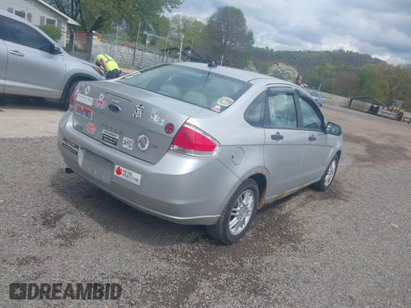 2010 Ford Focus SE with VIN 1FAHP3FN3AW143922, listed as a IAAI auction lot 42128921 with 162,628 mi miles. Bid and sale history available at carsss.com. Image 4.