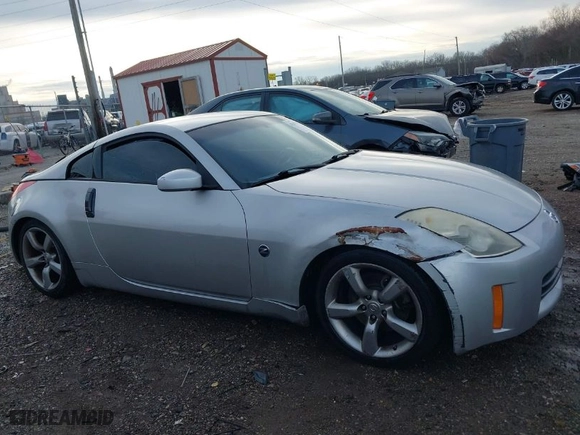 2006 Nissan 350Z with VIN JN1AZ34D06M307164, listed as a IAAI auction lot 41207211 with 158,023 mi miles. Bid and sale history available at carsss.com. Image 13.