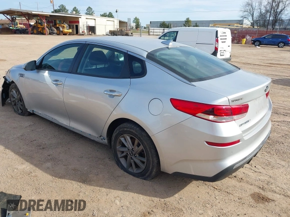 2020 Kia Optima LX with VIN 5XXGT4L34LG439434, listed as a IAAI auction lot 41743129 with 77,409 mi miles and . Bid and sale history available at carsss.com. Image 3.
