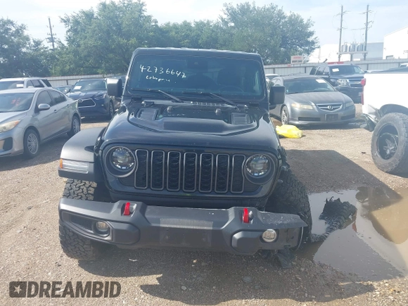 2024 Jeep Wrangler Rubicon with VIN 1C4PJXFG0RW271322, listed as a IAAI auction lot 42736647 with 32,319 mi miles and . Bid and sale history available at DreamBid. Image 12.
