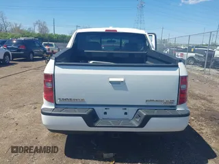 2009 Honda Ridgeline RTL with VIN 5FPYK16529B107871, listed as a IAAI auction lot 42049833 with 141,214 mi miles. Bid and sale history available at carsss.com. Image 17.
