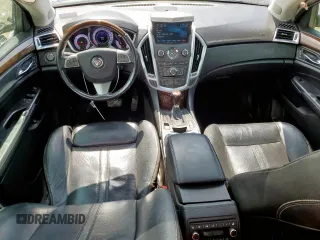 2012 Cadillac SRX Premium Collection z VIN 3GYFNCE39CS526425, wystawiony jako Copart lot #60557615 z przebiegiem 161 217 mil mil oraz Szkoda całkowita • Salvage title. Historia ofert i sprzedaży dostępna na DreamBid. Obrazek 8.