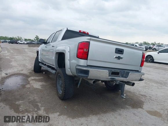 2015 Chevrolet Silverado 1500 LT with VIN 3GCUKREC8FG490856, listed as a IAAI auction lot 42067589 with 121,120 mi miles. Bid and sale history available at carsss.com. Image 3.