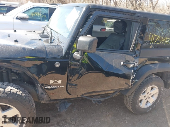 2009 Jeep Wrangler X with VIN 1J4FA24109L754379, listed as a IAAI auction lot 41754925 with 132,500 mi miles and . Bid and sale history available at DreamBid. Image 14.