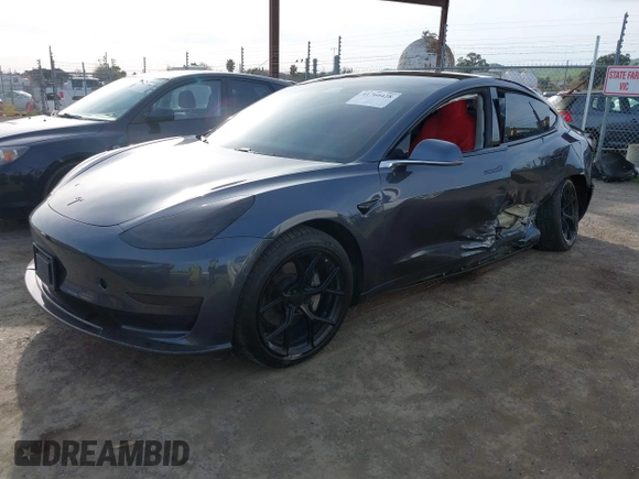 2019 Tesla Model 3 Long Range with VIN 5YJ3E1EB6KF413320, listed as a IAAI auction lot 41760428 with 90,441 mi miles and . Bid and sale history available at DreamBid. Image 18.