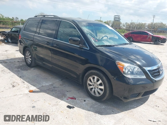 2010 Honda Odyssey EX-L with VIN 5FNRL3H79AB028724, listed as a IAAI auction lot 41687998 with 221,852 mi miles. Bid and sale history available at carsss.com. Image 1.