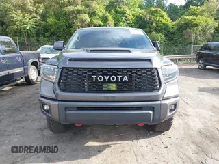 2021 Toyota Tundra SR5 with VIN 5TFDY5F19MX004939, listed as a IAAI auction lot 42197440 with 94,299 mi miles and . Bid and sale history available at DreamBid. Image 12.