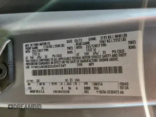 2013 Ford Escape SE z VIN 1FMCU9G92DUD07397, wystawiony jako Copart lot #63110315 z przebiegiem 167 296 mil mil oraz Czysty tytuł • Clean title. Historia ofert i sprzedaży dostępna na DreamBid. Obrazek 12.