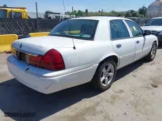 2005 Mercury Grand Marquis LS Premium with VIN 2MEFM75W15X631500, listed as a IAAI auction lot 42042103 with 164,810 mi miles. Bid and sale history available at carsss.com. Image 4.