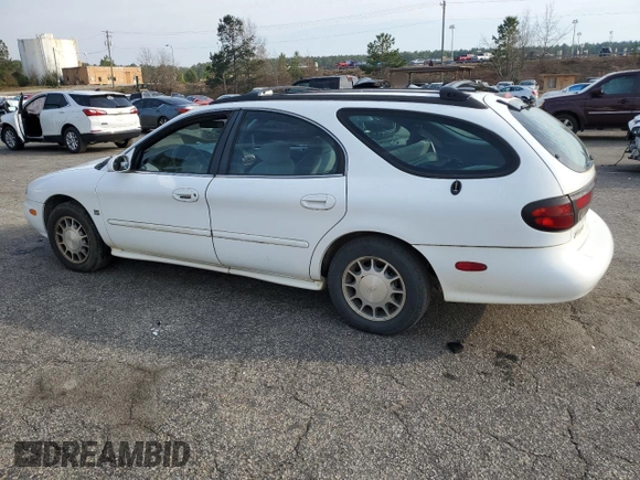1999 Ford Taurus SE z VIN 1FAFP58S0XA272714, wystawiony jako Copart lot #48966215 z przebiegiem 255 885 mil mil oraz Szkoda całkowita • Salvage title. Historia ofert i sprzedaży dostępna na DreamBid. Obrazek 2.