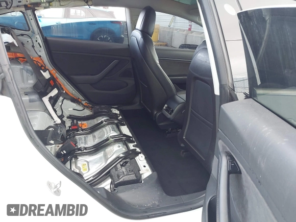 2018 Tesla Model 3 Long Range Battery with VIN 5YJ3E1EA3JF023300, listed as a IAAI auction lot 41925504 with 100,512 mi miles and . Bid and sale history available at DreamBid. Image 8.