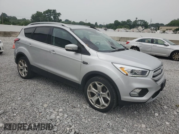 2019 Ford Escape Titanium with VIN 1FMCU9J90KUA07976, listed as a Copart auction lot 59565275 with 189,655 mi miles and Salvage title. Bid and sale history available at DreamBid. Image 4.