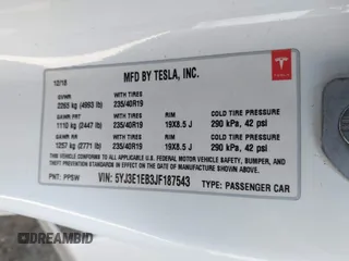 2018 Tesla Model 3 Long Range Battery z VIN 5YJ3E1EB3JF187543, wystawiony jako IAAI lot #41879169 z przebiegiem 74 144 mil mil oraz . Historia ofert i sprzedaży dostępna na DreamBid. Obrazek 9.
