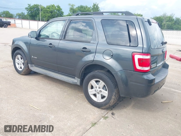 2009 Ford Escape Hybrid with VIN 1FMCU49319KC97511, listed as a IAAI auction lot 42735047 with 255,260 mi miles and . Bid and sale history available at DreamBid. Image 3.
