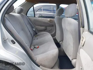 2002 Toyota Corolla CE with VIN 1NXBR12E12Z639542, listed as a IAAI auction lot 41535788 with 204,999 mi miles and . Bid and sale history available at DreamBid. Image 8.