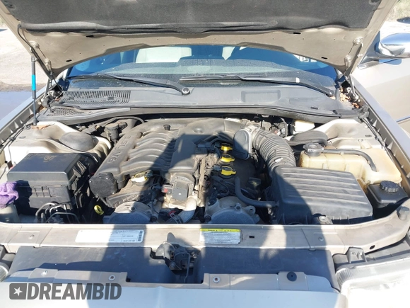 2009 Chrysler 300 Limited with VIN 2C3KA33V99H592963, listed as a IAAI auction lot 42041417 with 160,829 mi miles. Bid and sale history available at carsss.com. Image 10.