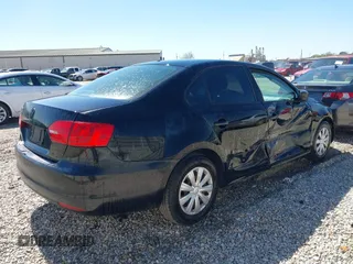 2013 Volkswagen Jetta Sedan S with VIN 3VW2K7AJ9DM353114, listed as a IAAI auction lot 41822324 with 95,658 mi miles. Bid and sale history available at carsss.com. Image 4.