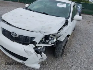 2010 Toyota Corolla with VIN 1NXBU4EEXAZ167898, listed as a IAAI auction lot 42050056 with 100,975 mi miles and . Bid and sale history available at DreamBid. Image 6.