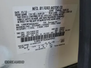 2013 Lincoln MKS EcoBoost with VIN 1LNHL9FTXDG604941, listed as a Copart auction lot 47445485 with 66,591 mi miles and Salvage title. Bid and sale history available at DreamBid. Image 14.