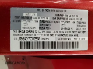 2016 Mazda CX-5 Touring z VIN JM3KE4CY7G0898598, wystawiony jako Copart lot #56717895 z przebiegiem 103 548 mil mil oraz Szkoda całkowita • Salvage title. Historia ofert i sprzedaży dostępna na DreamBid. Obrazek 14.