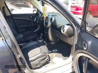 2012 MINI Countryman S with VIN WMWZC3C55CWL82709, listed as a IAAI auction lot 42002966 with 120,611 mi miles and . Bid and sale history available at DreamBid. Image 5.