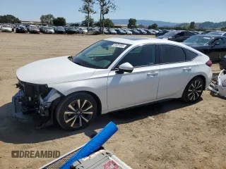 2024 Honda Civic EX-L z VIN 19XFL1H71RE010212, wystawiony jako Copart lot #54681695 z przebiegiem 12 221 mil mil oraz Szkoda całkowita • Salvage title. Historia ofert i sprzedaży dostępna na DreamBid. Obrazek 1.