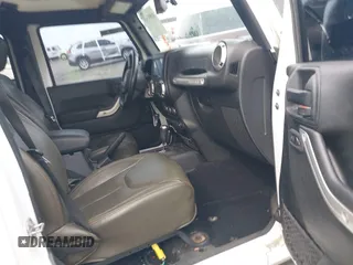 2017 Jeep Wrangler Unlimited Sahara with VIN 1C4BJWEG3HL752719, listed as a IAAI auction lot 41892600 with 127,486 mi miles. Bid and sale history available at carsss.com. Image 5.