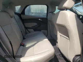 2016 Ford Focus Electric z VIN 1FADP3R49GL230588, wystawiony jako Copart lot #48019985 z przebiegiem 54 197 mil mil oraz Szkody całkowita. Historia ofert i sprzedaży dostępna na DreamBid. Obrazek 10.